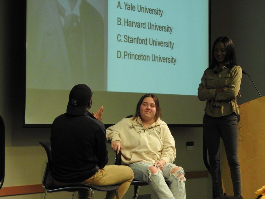 Emi Taylor watches as Jontay Brown answers a question about W.E.B. Du Bois.