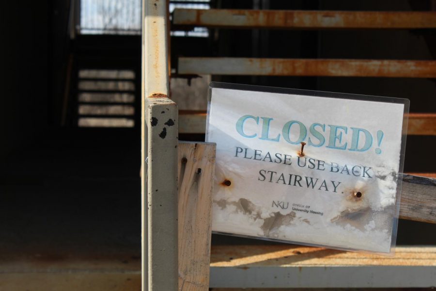 A+closed+stairway+sign+on+one+of+the+stairways+of+Sycamore+Hall+at+Woodcrest+Apartments.