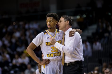 Dantez Walton (32) talks with Mens Basketball Head Coach Darrin Horn  during a free throw during the game against Wright State. The Norse fell to Wright State 64-62 during the final home game of the season.