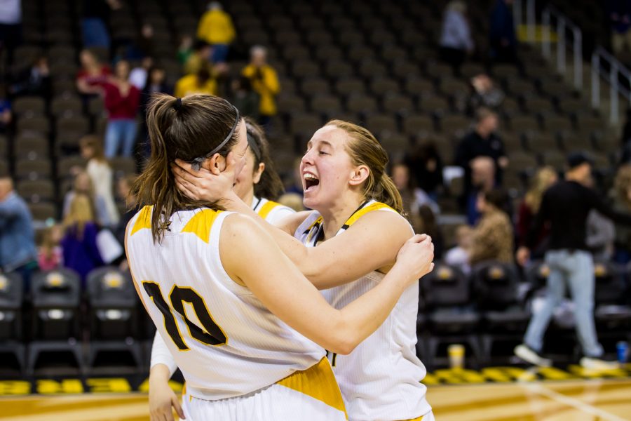 Molly Glick (24) reacts with Grayson Rose (10) following the game against IUPUI. The Norse defeated first ranked team IUPUI 65-62 on Saturday Afternoon.