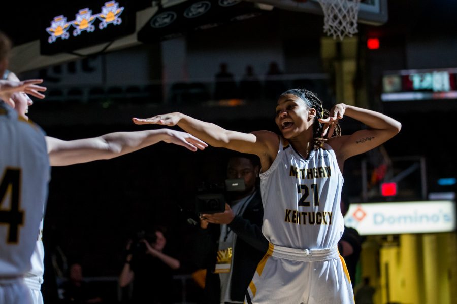 Tayah Irvin (21) cheers during the introductions before  the first round of the Horizon League Tournament against Detroit Mercy. The Norse defeated Detroit Mercy 94-47.