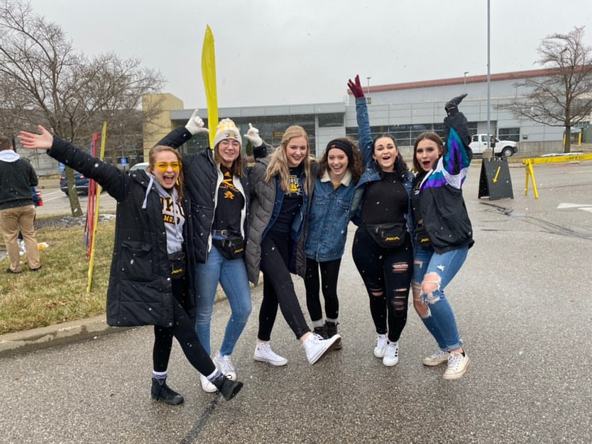 Weihe (second to the left) with her friends at NKU. 