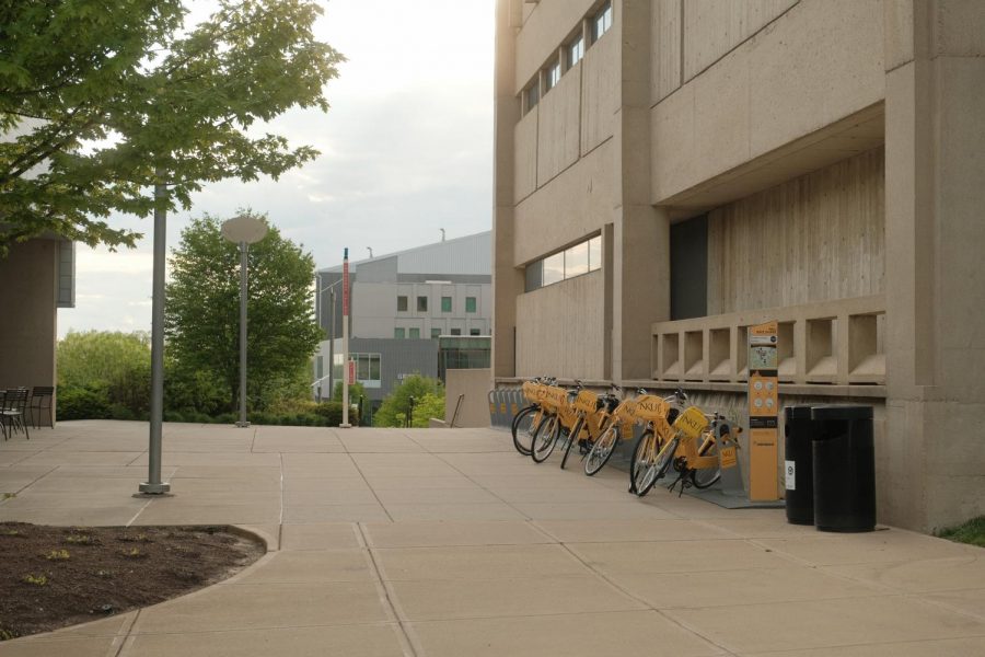 The bike share rack outside Starbucks.