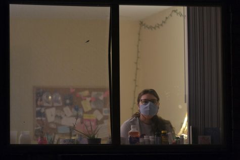 Senior Theatre and Philosophy major Isabel Sleczkowski sits in her apartment where she's been quarantining since July.