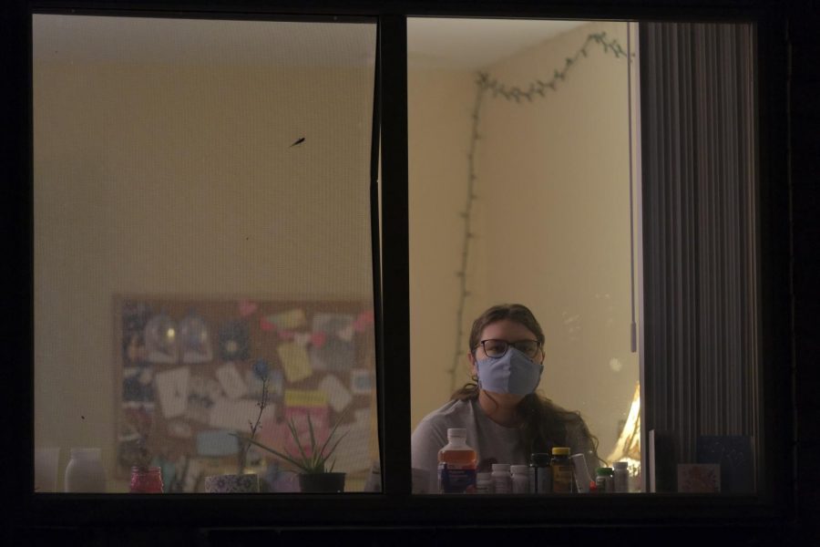 Senior Theatre and Philosophy major Isabel Sleczkowski sits in her apartment where she's been quarantining since July. 