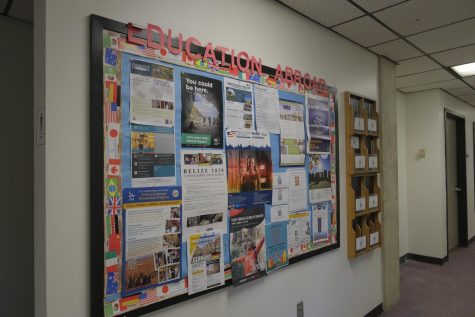 An Education Abroad bulletin board outside their office in University Center room 330.