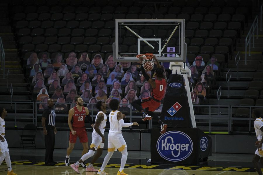 Ball State's Miryne Thomas (0) dunks the ball against NKU.