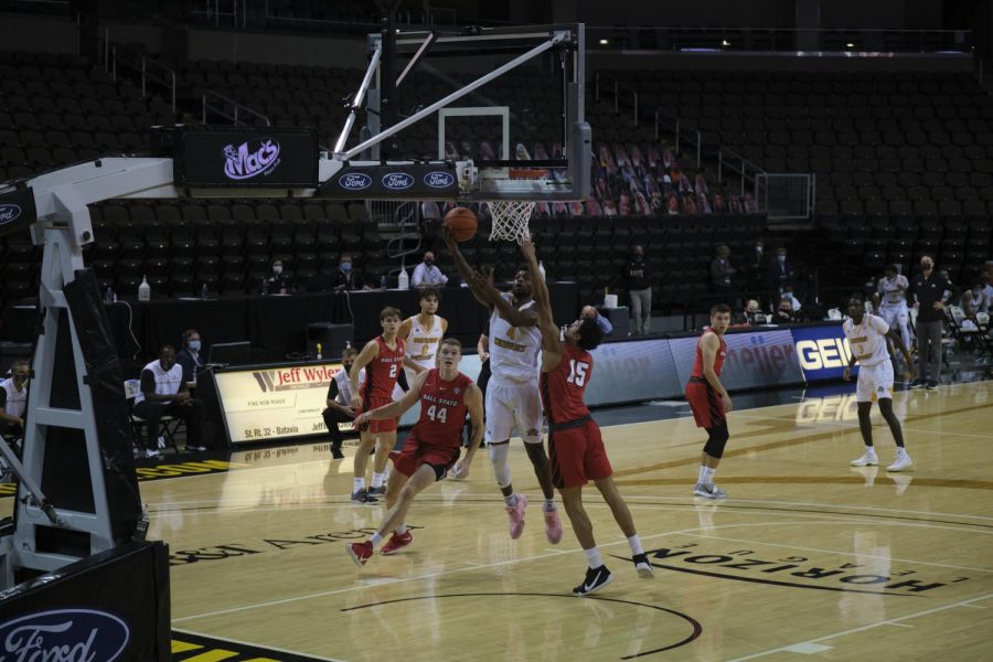 Adrian Nelson goes up for a shot against Ball State. Nelson would finish with a career-high 19 rebounds in the contest.