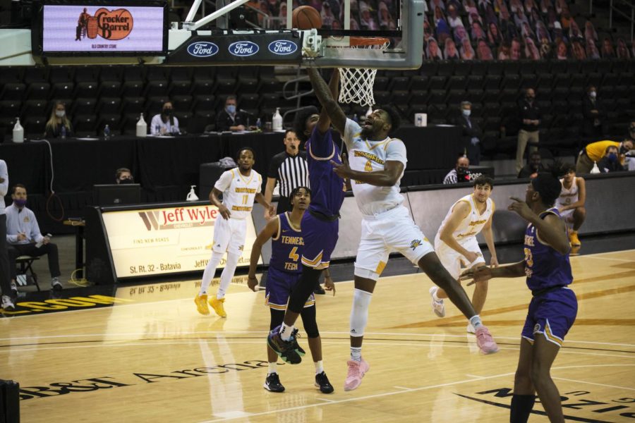 Adrian Nelson (4) lays up a shot against Tennessee Tech. Nelson would finish with 10 points on the night.