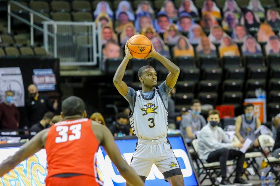 Marques Warrick (3) looks for an open teammate in NKUs game against Youngstown State. Warrick finished with 18 points in the victory.