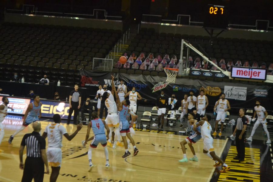 Bryson Langdon attempts the game-winning jump shot to beat the UIC Flames 69-67 on Saturday.