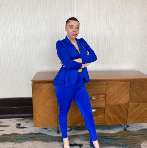 Aliya Cannon wearing a blue pants suit. 