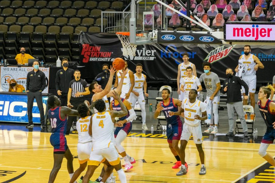 David Bӧhm tips the ball toward the basket, eventually scoring the game winner at the buzzer to lift the Norse over Detroit Mercy.