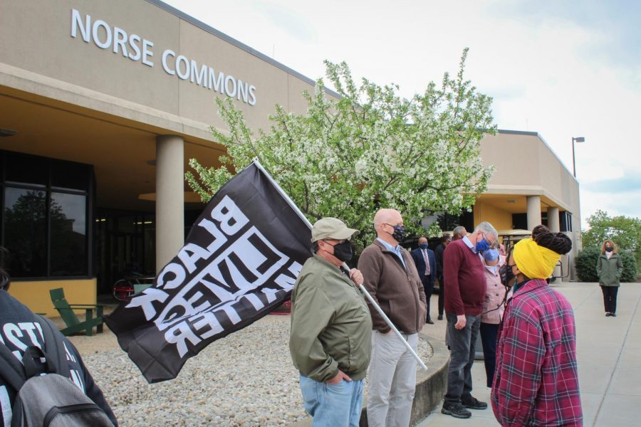 Kaitlin Minniefield talks to a community member during the march.