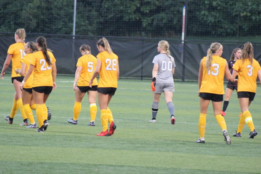 Members+of+the+NKU+womens+soccer+team+walk+back+on+to+the+field+following+a+break+in+the+action+against+Eastern+Kentucky.