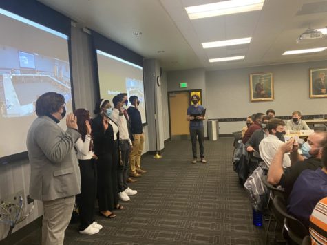 The induction of six new SGA senators in the Student Governance room