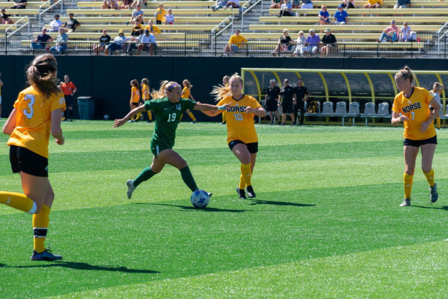 A trio of NKU players surround a Cleveland State opponent during the Norse 1-0 win on Sunday.