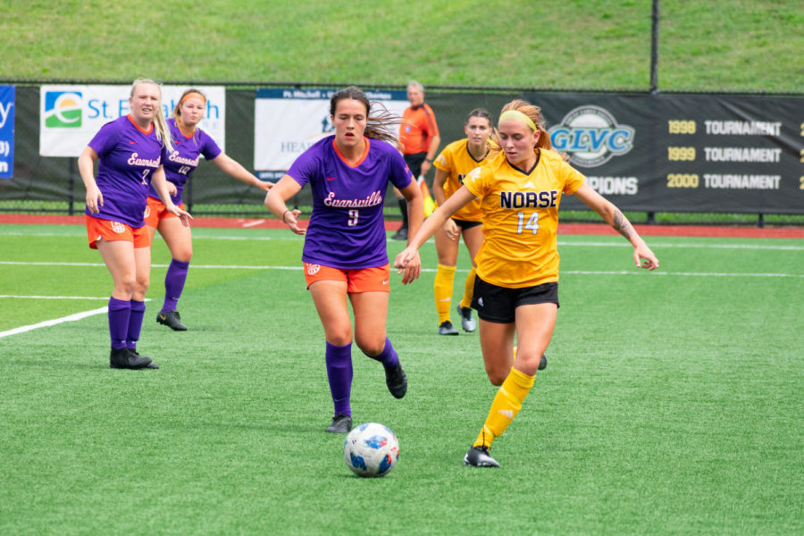 NKUs Lindsey Meyer (14) chases down the ball against Evansville. Meyer scored the Norse lone goal of the match on Sunday.
