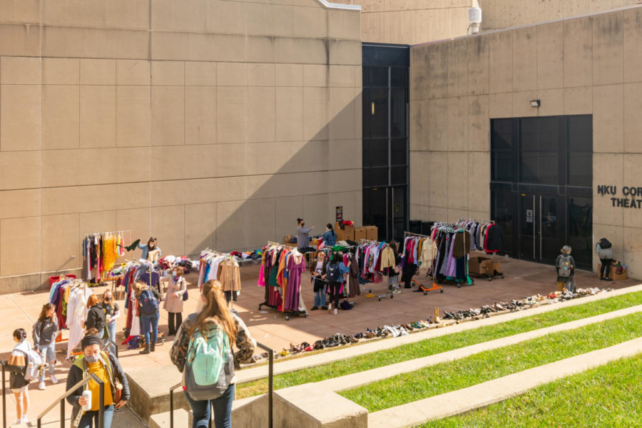 Students shopping around the many racks of costumes outside Corbett Theatre at SOTA.