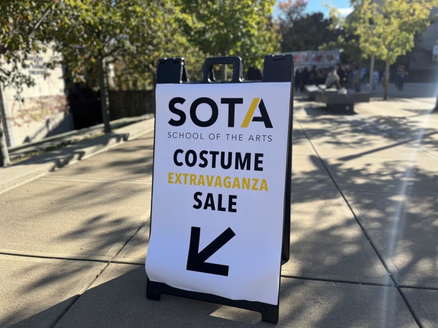 Sign outside of the SOTA building. "SOTA School of The Arts Costume Extravaganza Sale"