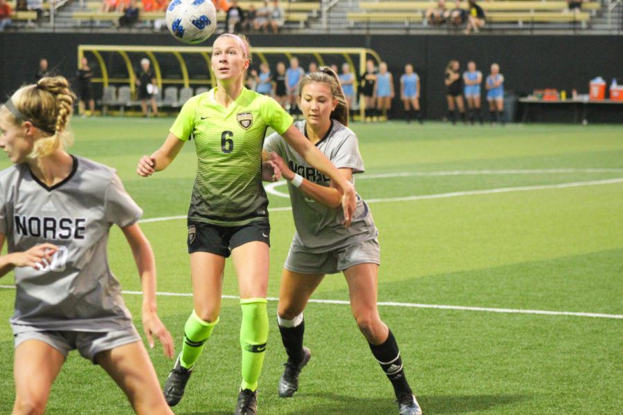 NKU senior Lily Menssen (3) defends Oaklands Jayna Fraser during the Norse 3-0 loss on Thursday.