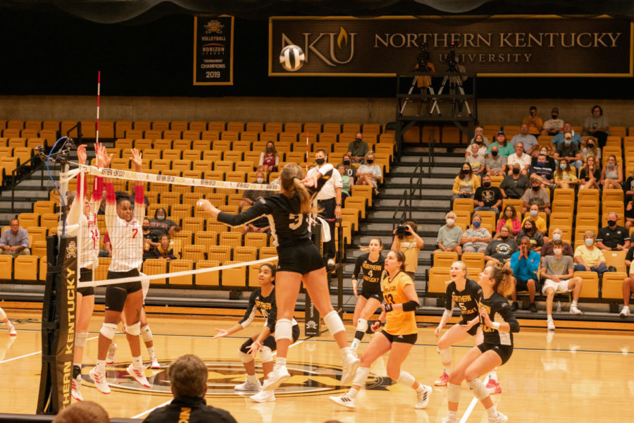 Senior Anna Brinkmann (3) leaps to spike the ball in NKU's win over IUPUI.