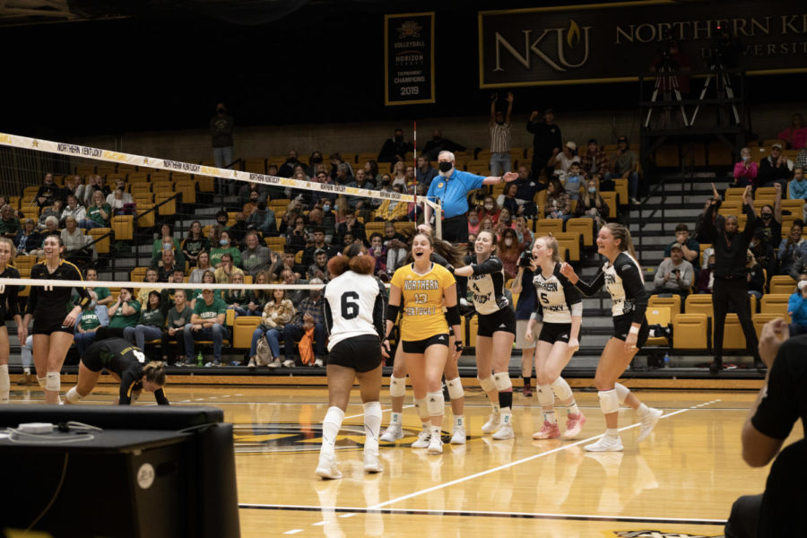 NKU volleyball players celebrate a point on Friday night against Wright State. The Norse fell 3-2 to the Raiders.
