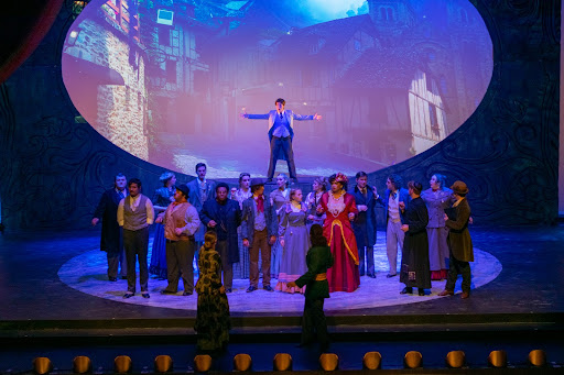 The company in the final scene of “The Mystery of Edwin Drood.”
