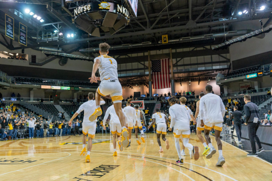 The NKU mens basketball team celebrates following their 74-73 win over Eastern Michigan on Thursday at BB&T Arena.