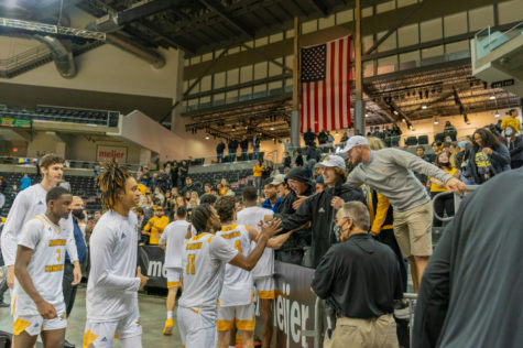 The Norse celebrate with fans following their dramatic win over Eastern Michigan.