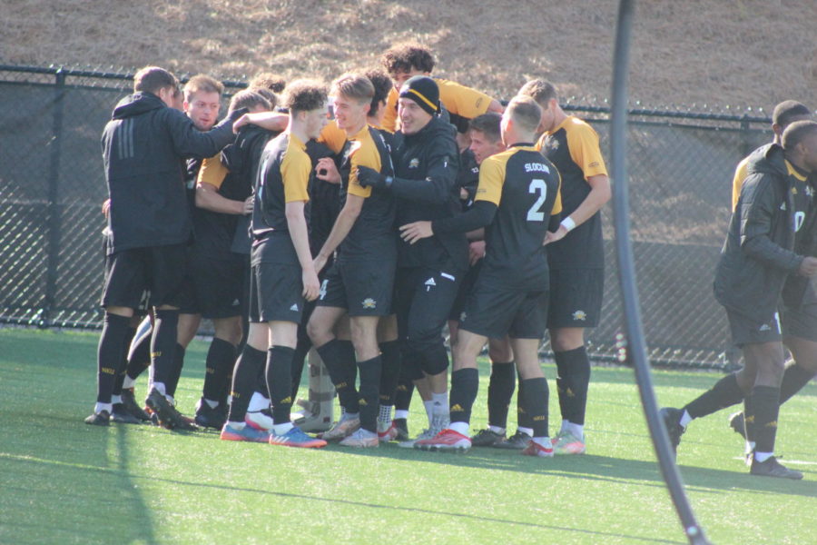 NKU players celebrate a goal by Brodie Sallows in the second half against Oakland on Wednesday.