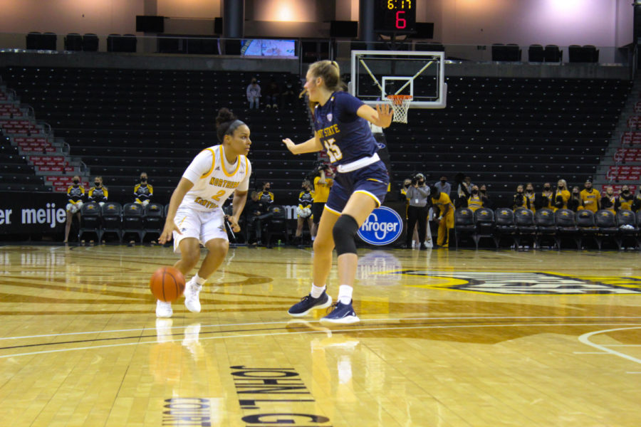 NKU guard Ivy Turner (2) drives past a Kent State defender on Wednesday night.