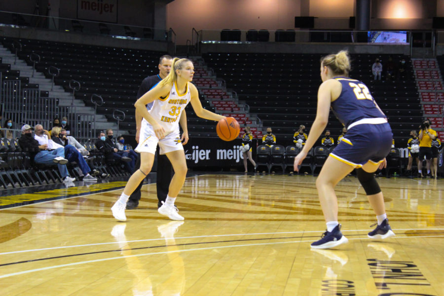 NKU guard Ellie Taylor (33) dribbles on the perimeter during the Norse 80-73 loss on Wednesday to Kent State.