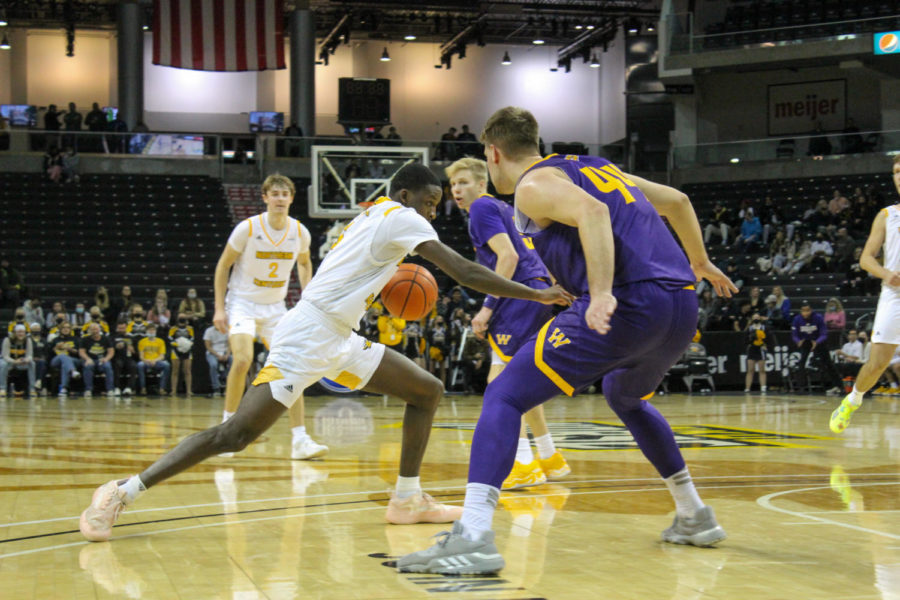 NKU guard Marques Warrick (3) drives toward the basket against Western Illinois on Monday at BB&T Arena.