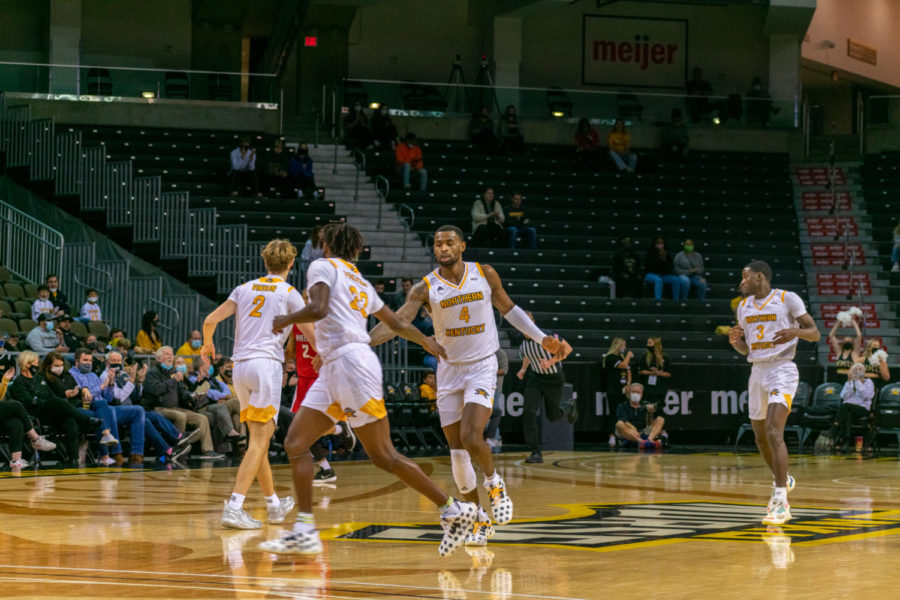 Adrian Nelson and Trevon Faulkner high-five during the Norse win over Wheeling on Tuesday.