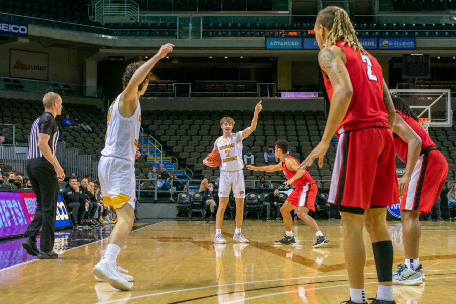 NKU guard Sam Vinson (2) directs his teammates at the top of the key on Tuesday against Wheeling.