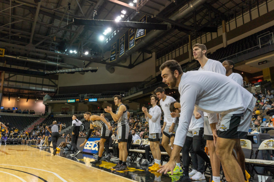 The NKU bench celebrates during the Norse 75-62 win over Canisius on Wednesday at BB&T Arena.
