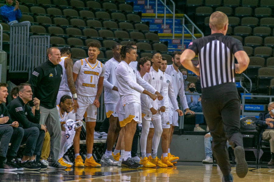 The+NKU+mens+basketball+team+celebrates+during+a+win+over+Wheeling+on+Nov.+9.