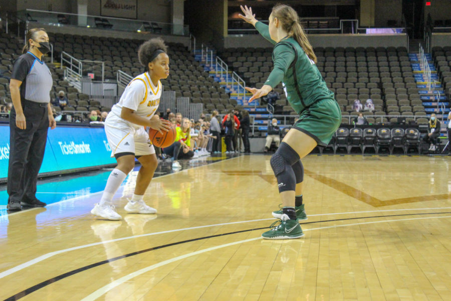 NKU guard Kailee Davis with the ball on the perimeter against Cleveland State on Friday night at BB&T Arena.