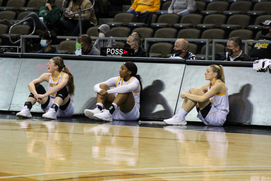 A trio of NKU players wait to check in to the game on Friday night against Cleveland State.