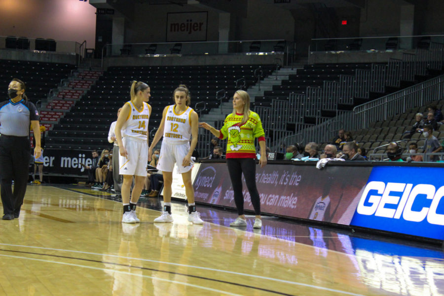 NKU head coach Camryn Whitaker speaks to several of her players on Friday against Cleveland State.