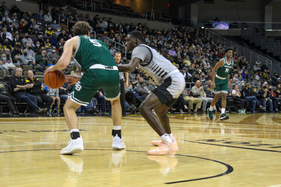 NKU guard Marques Warrick defends a Green Bay player on Thursday. The Norse forced nine turnovers in the win.