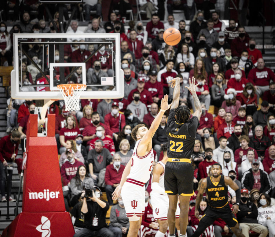 NKU guard Trevon Faulkner (22) takes a shot from the top of the key against Indiana on Wednesday.