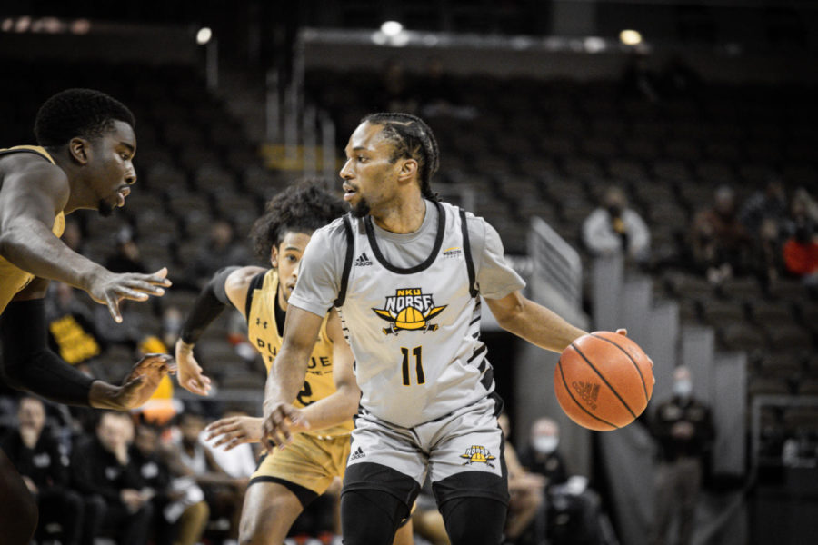 NKU+guard+Bryson+Langdon+%2811%29+looks+for+a+teammate+during+the+Norse+win+over+Purdue+Fort+Wayne+on+Friday.