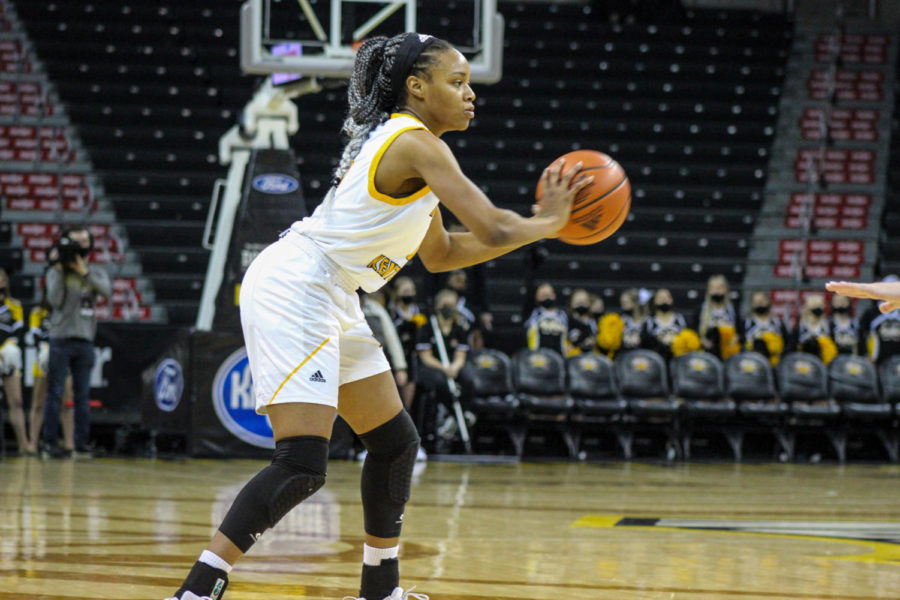 Guard Khamari Mitchell-Steen looks for a teammate to pass to against Milwaukee. 