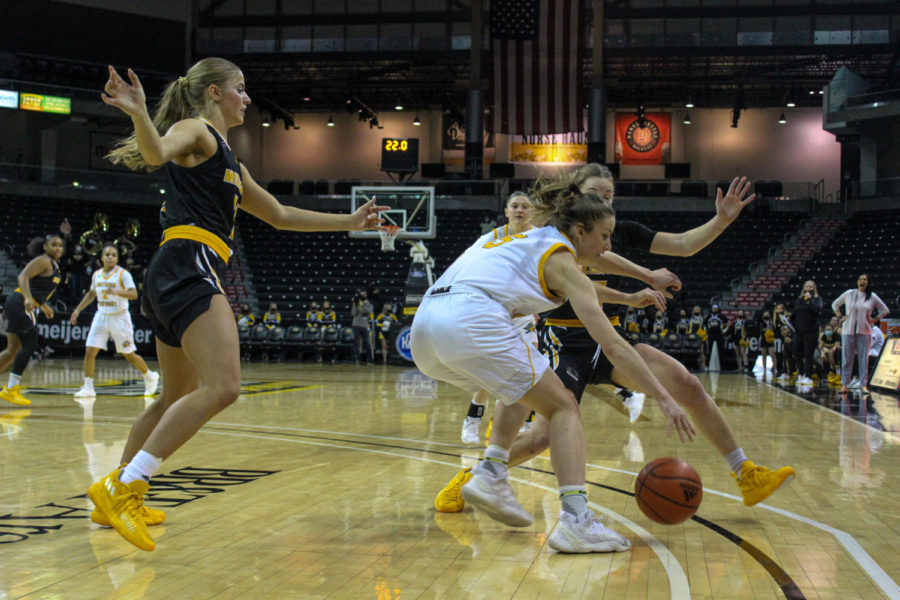 Guard Lindsey Duvall dribbles in traffic against Milwaukee on Thursday at BB&T Arena.