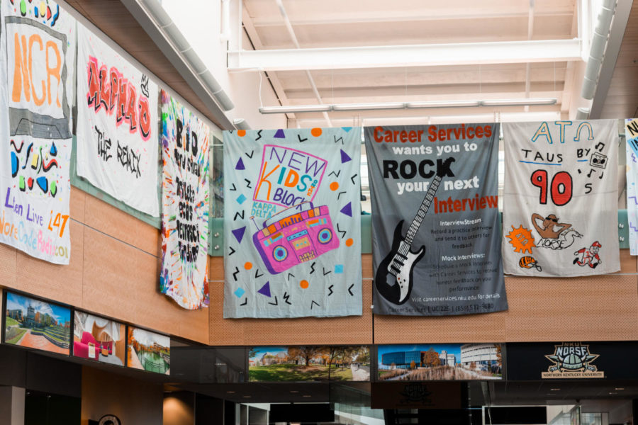 Homecoming banners hanging in the SU from various campus organizations.
