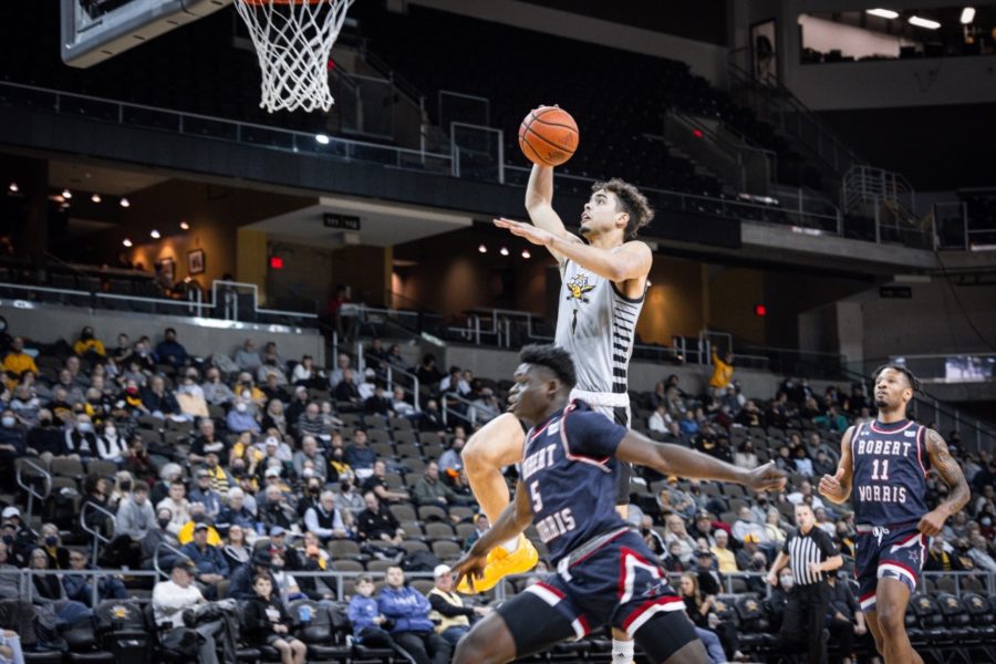 Guard Trey Robinson goes for a dunk against Robert Morris on Thursday night. 