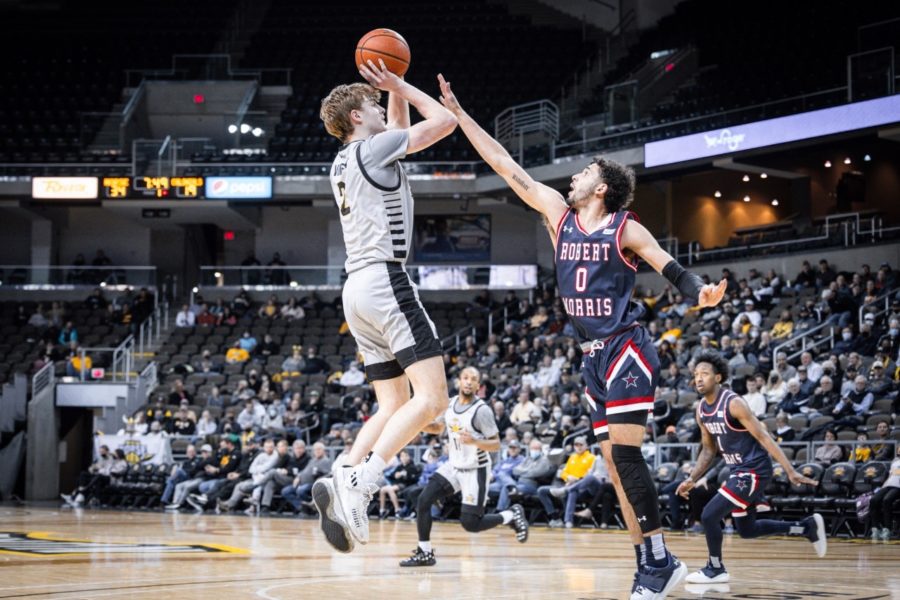 NKU guard Sam Vinson (2) takes a shot over a Robert Morris defender. Vinson finished with eight points.