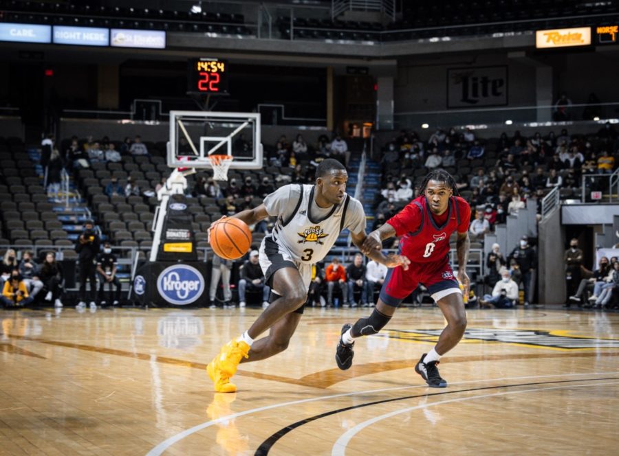 NKU guard Marques Warrick (3) drives against Detroit Mercy on Saturday. Warrick finished with 17 points in the loss.